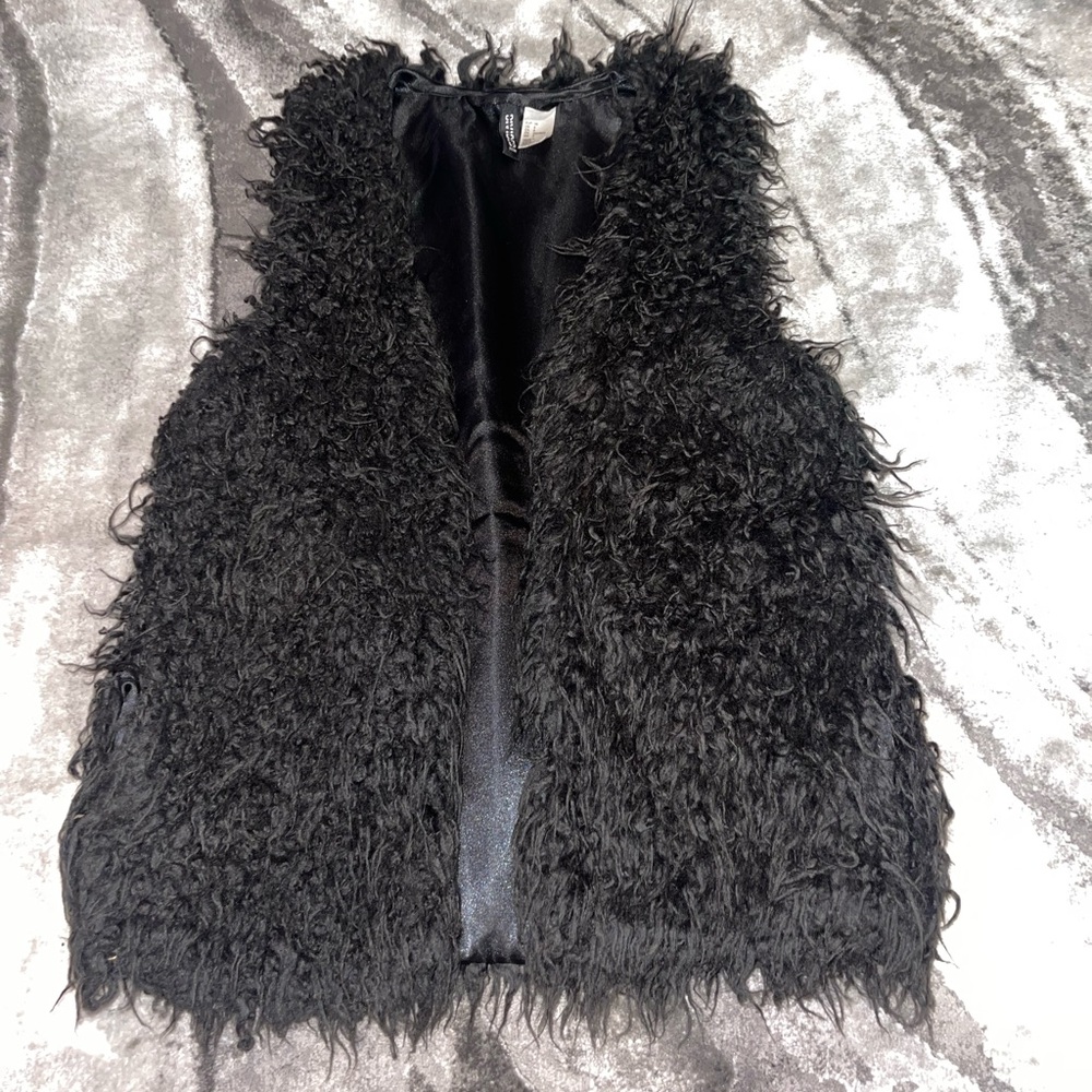Black furry vest